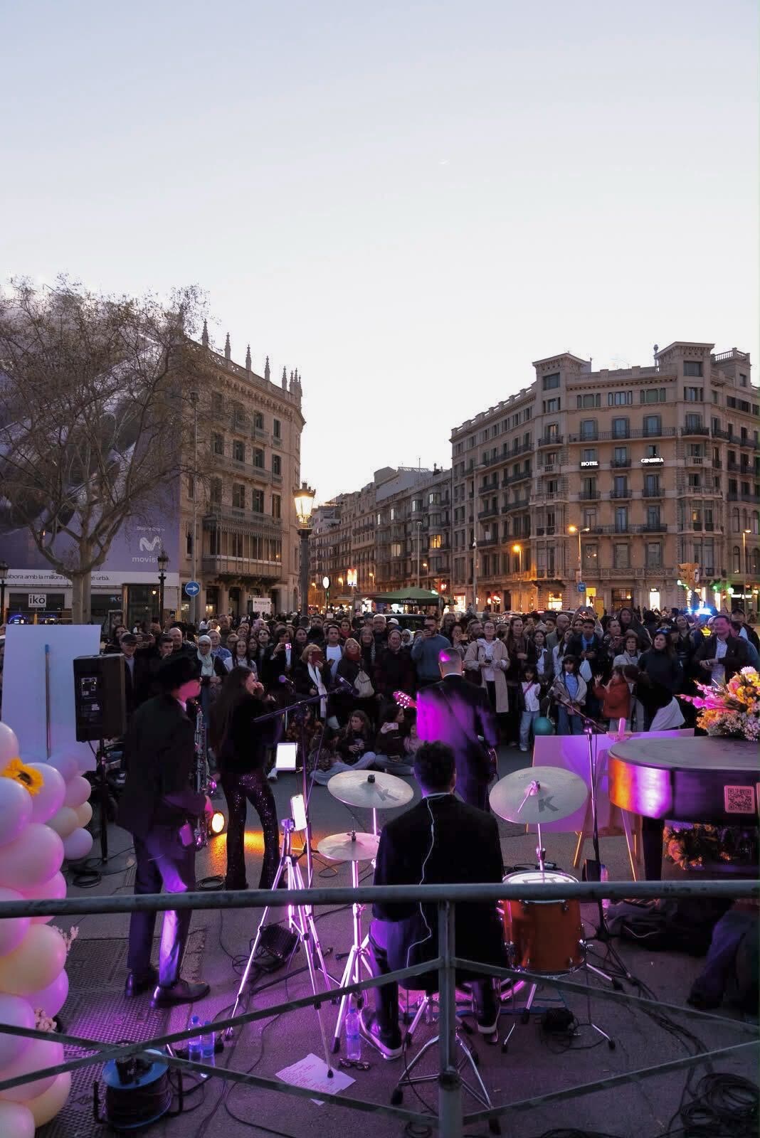 Live band performing at a public music event in Plaça Catalunya