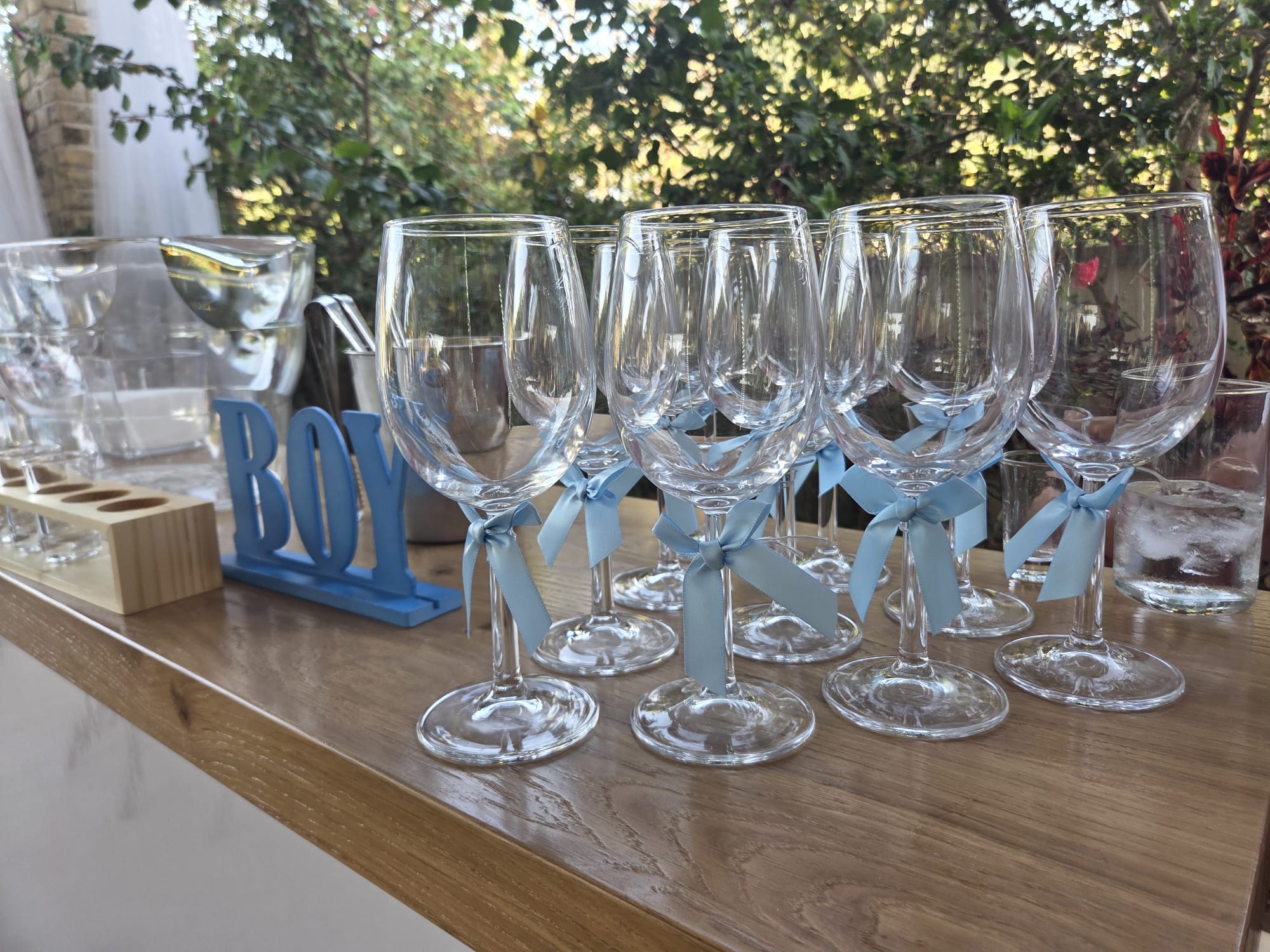 Event glassware with blue ribbons