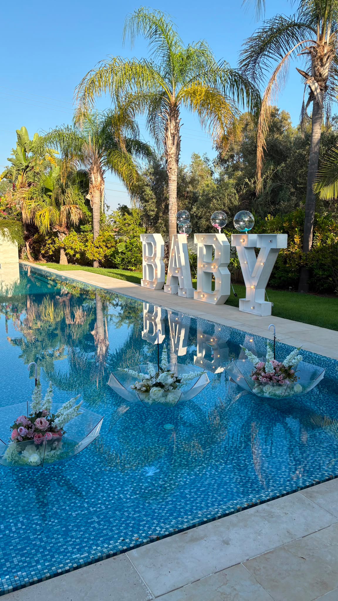 Birthday celebration by a pool